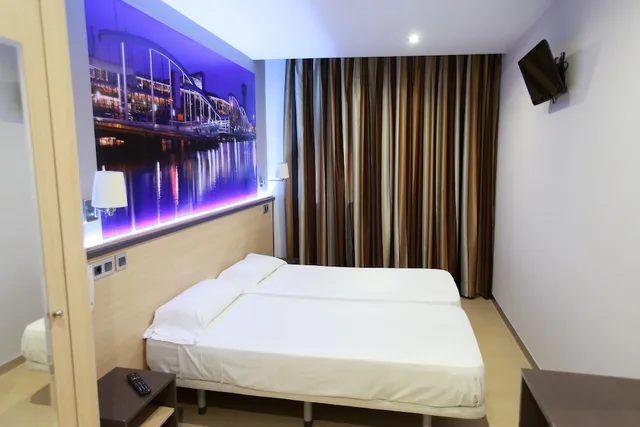 غرفة بسريرين منفصلين، Hostal Las Flores 2/6