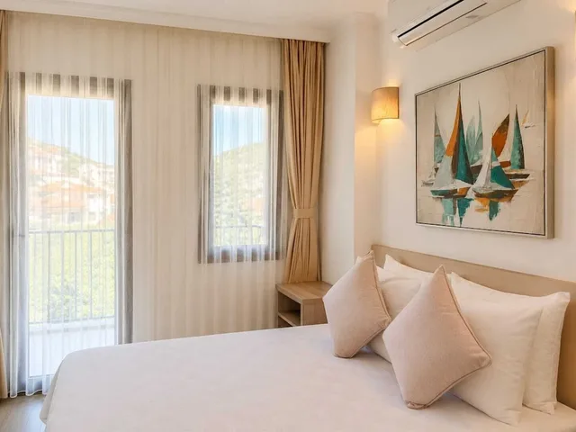 غرفة بسريرين منفصلين بإطلالة على البحر، Aria Doria Otel 5/10
