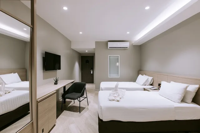 غرفة ديلوكس بسريرين منفصلين، The Rich Hotel Korat 2/7