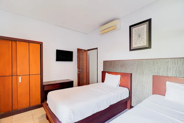 غرفة ديلوكس بسريرين منفصلين، New Asta Graha Homestay 1/5