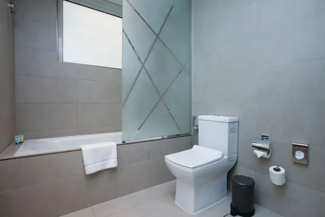 غرفة ديلوكس بسرير كينج بغرفة نوم واحدة، Sitara Hotel Apartment L.L.C 3/3