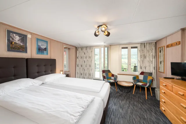 Triple Room Eiger، Jungfrau Lodge - Swiss Mountain Hotel 1/7
