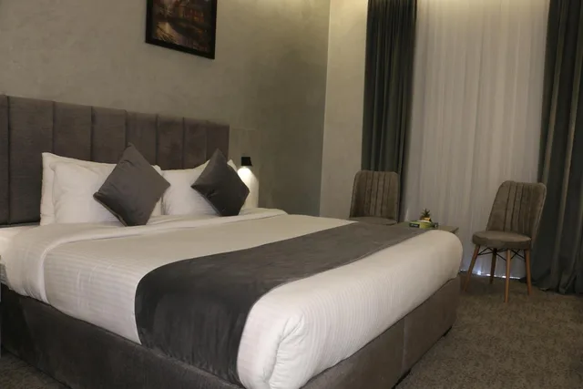 غرفة عائلية بإطلالة على الحديقة، Kaya Hotel Amman 1/10