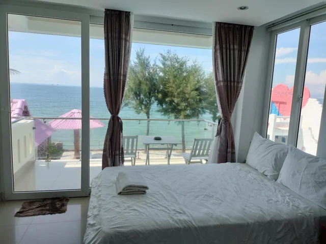 غرفة بسريرين منفصلين بإطلالة على البحر، Hai Yen Resort 1/1