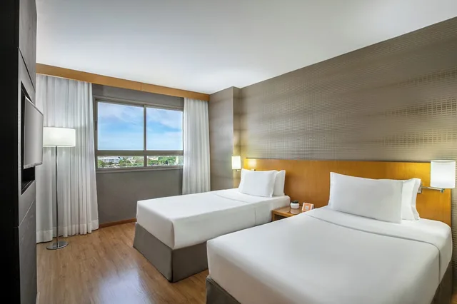 غرفة قياسية بسريرين منفصلين، Brasil 21 Suites Affiliated by Melia 1/10