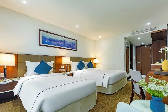 غرفة بريميير ثلاثية بسرير كوين وسرير فردي، Pavilion Hotel Da Nang 1/8