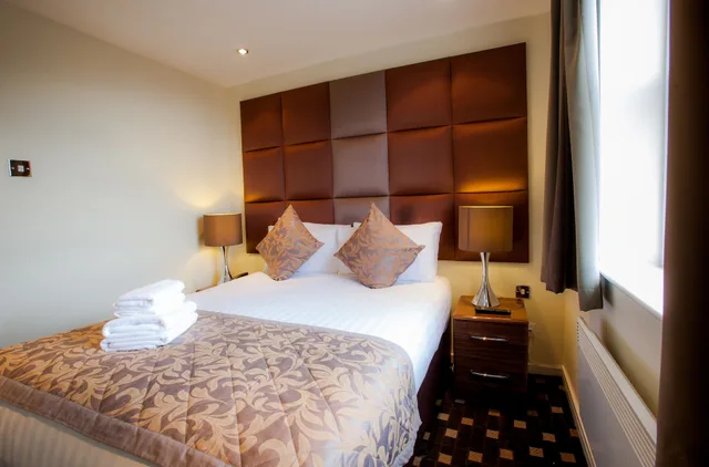 استوديو رباعي بسرير مزدوج مع أريكة، Grand Plaza Serviced Apartments 1/10