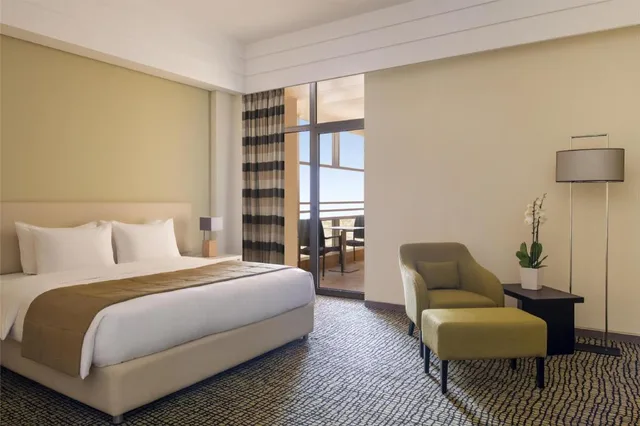 غرفة بسرير كينج بشرفة، Bristoria Hotel Erbil 2/5