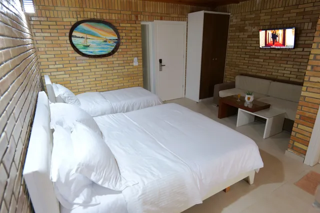 غرفة ديلوكس ثلاثية بسرير مزدوج وسريرين منفصلين بإطلالة على البحر، Hotel Piccollino 2/6
