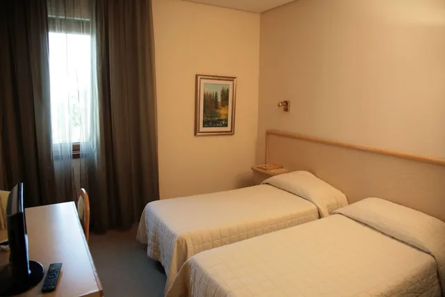 غرفة متصلة رباعية بسريرين كوين، HOTEL BASSETTO 1/2