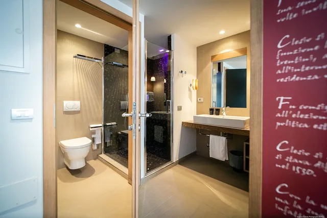 غرفة ديلوكس بسرير كوين وسرير فردي، Boutique Exclusive B&B Trento 9/10