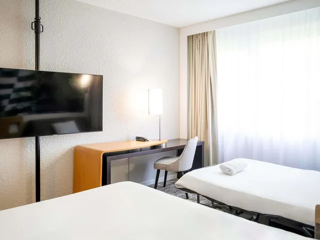 غرفة كلاسيكية بسرير مزدوج بإطلالة على الحديقة مع أريكة، Novotel Bordeaux Merignac 3/8