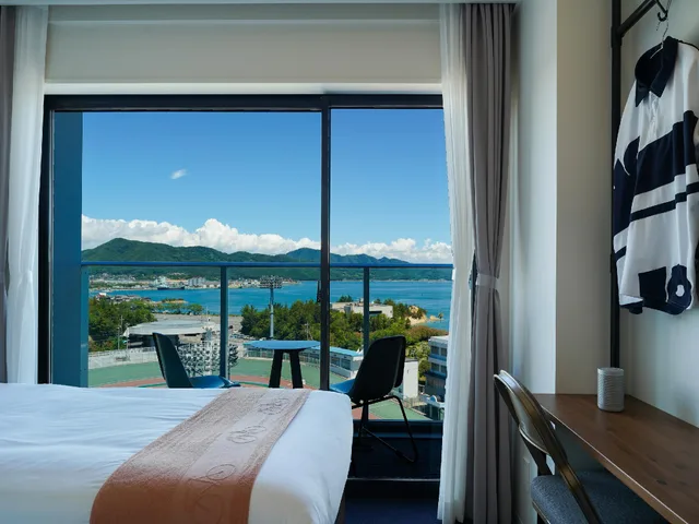 غرفة قياسية بسريرين منفصلين بإطلالة على البحر، SETOUCHI KEIRIN HOTEL 10 by Onko Chishin 1/2