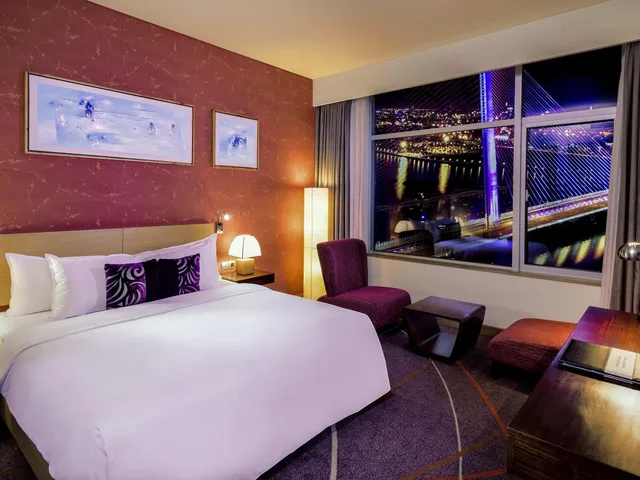 غرفة ديلوكس تنفيذية بسرير كوين بإطلالة على النهر مع دخول الصالة في طابق مرتفع، Grand Mercure Danang 5/6