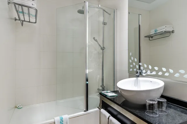 غرفة مفردة بسرير كوين، Hotel Suizo 4/8