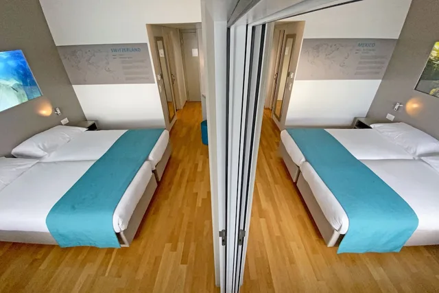 Connecting, Standard, 2 Queen Beds, Aquatis Hotel 1/4