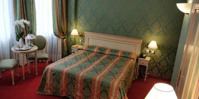 غرفة كلاسيكية ثلاثية بسرير كوين مع أريكة، Hotel Villa Delle Palme 8/10