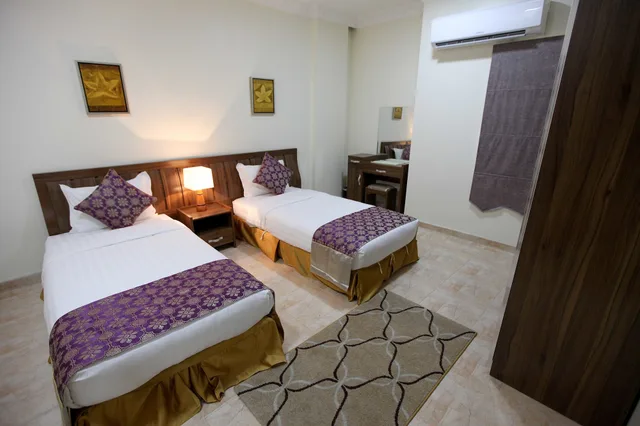 شقة بسرير مزدوج وسريرين منفصلين بغرفتي نوم، فندق برج العنوان(Enwan Suites Serviced Apartments) 6/10