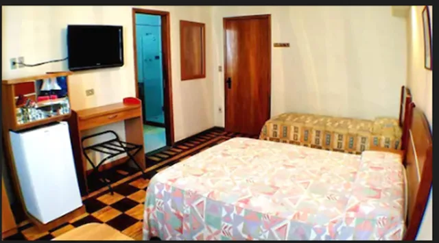 غرفة رباعية بسرير مزدوج وسريرين منفصلين، Itajuba Hotel 3/6