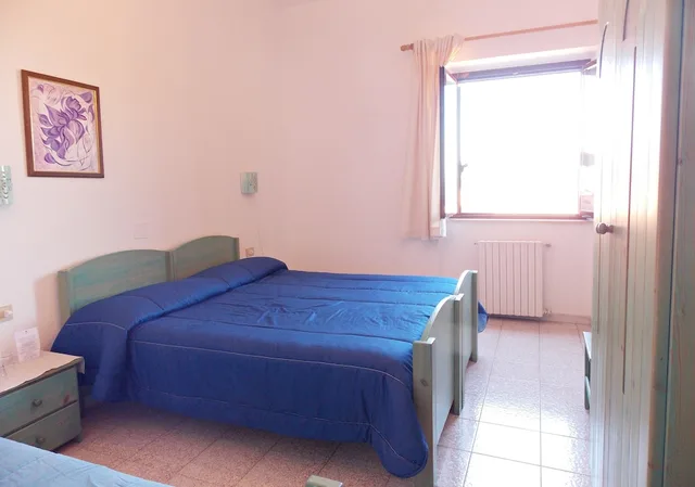 غرفة بسرير مزدوج وسرير فردي، Enis Monte Maccione 1/7