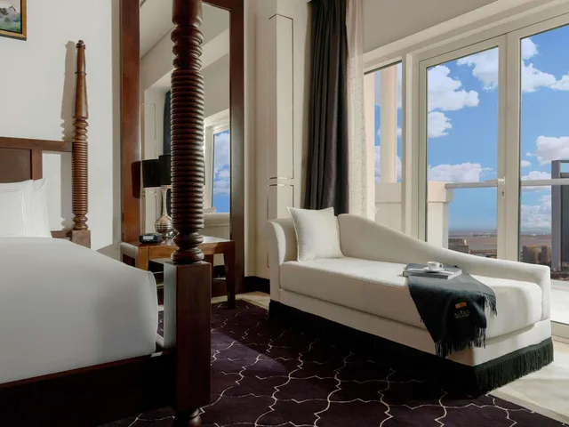 جناح ملكي بسريرين منفصلين وسريرين كينج بـ4 غرف نوم، Rixos Marina Abu Dhabi 3/4