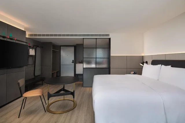 غرفة عائلية كبيرة بسرير كينج وسرير فردي، Yudu Hotel 3/9