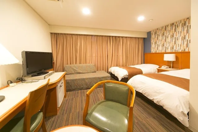 غرفة ديلوكس بسريرين منفصلين مع أريكة، Hyper Inn Takamatsu Ekimae 1/2
