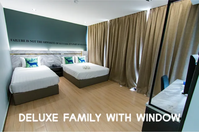 غرفة ديلوكس عائلية بسرير كوين وسرير فردي، Hotel 99 Sepang KLIA 1/2