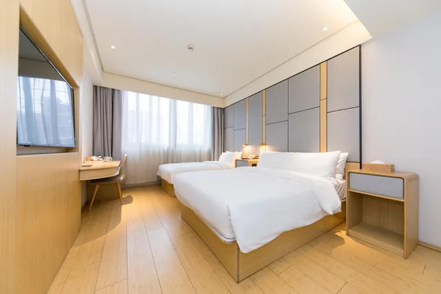 غرفة ديلوكس عائلية بسرير مزدوج وسرير فردي، JI Hotel Shanghai The Bund Jiujiang Road 1/2