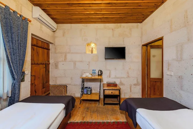 جناح ديلوكس بسريرين منفصلين وسرير كينج، Düven Hotel 10/10