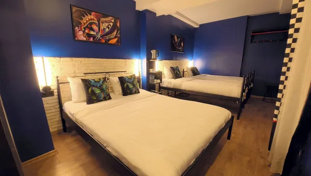 غرفة قياسية رباعية بسريرين كوين، Think Hotel 4/9