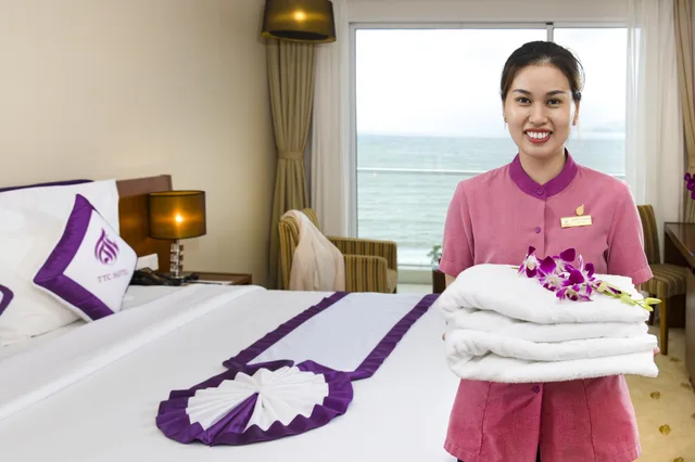 غرفة ديلوكس بسرير كينج بإطلالة جزئية على البحر، TTC Hotel - Michelia 10/10