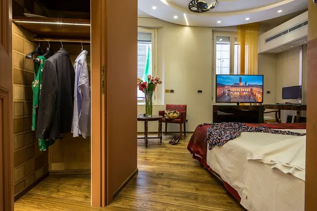 غرفة ديلوكس ثلاثية بسرير كوين مع أريكة، Art Hotel Commercianti 5/10