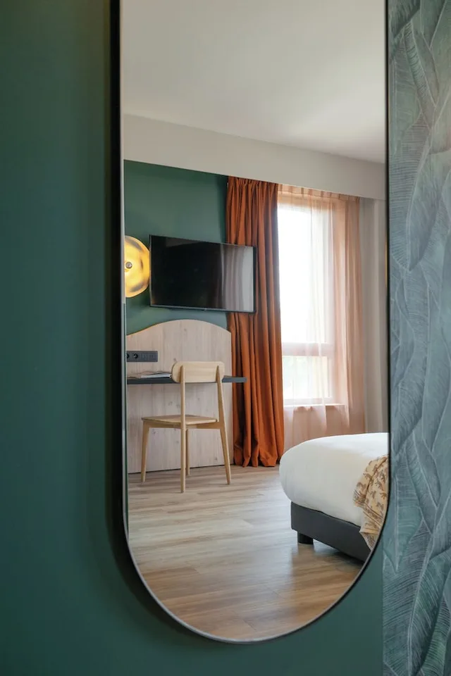 غرفة سوبيريور عائلية مفردة بسرير كوين مع أريكة، All Suites Hotel Paris Pleyel L’Ile Saint Denis 8/10