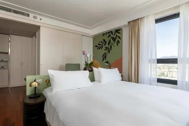 غرفة تنفيذية بسرير كينج، DoubleTree by Hilton Florence Metropole 1/4