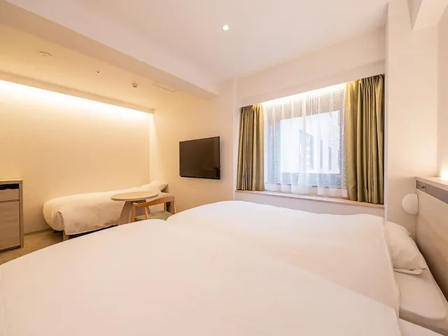 غرفة ديلوكس بثلاثة أسرّة في المبنى الرئيسي، Richmond Hotel Sendai 1/4