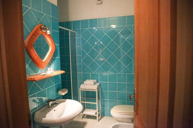 غرفة كومفورت رباعية بسريرين منفصلين، Micalosu Hotel 4/4