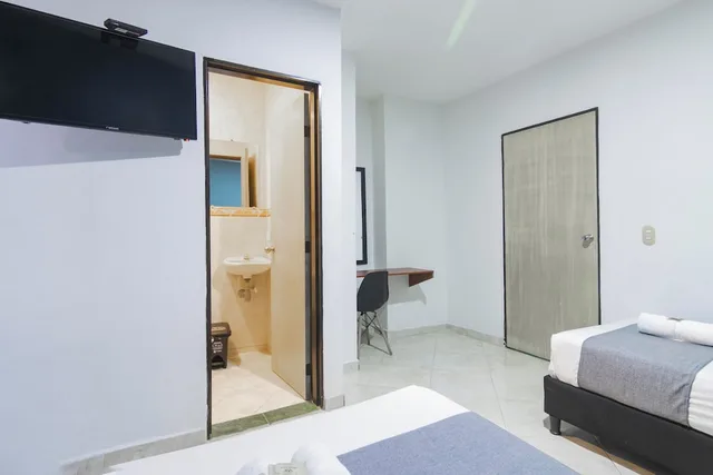 غرفة ثلاثية بسرير مزدوج وسرير فردي، Ayenda 1228 Balcones de la 70 9/9