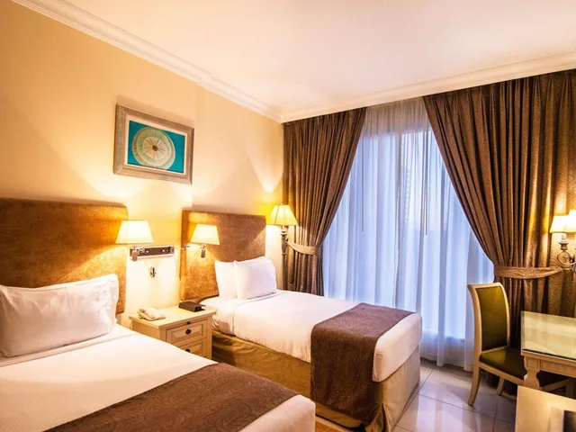 شقة ديلوكس بسرير كينج وسريرين منفصلين بإطلالة على المدينة بغرفتي نوم، Mercure Dubai Barsha Heights Hotel Suites and Apartments 11/13