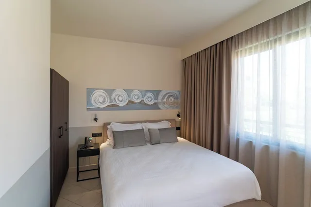 1 Bedroom, Signature, Suite, King Bed, Sofa, Mariette Apartments 1/2