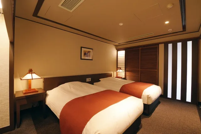 غرفة ملكية بسريرين منفصلين وفرشتي فوتون بإطلالة على البحر بغرفة نوم واحدة، Jodogahama Park Hotel 1/2