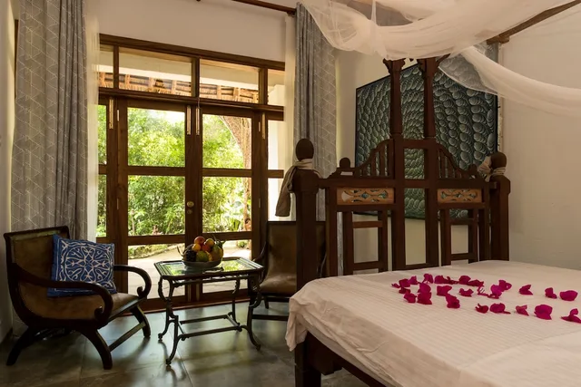 غرفة بسرير فردي، Tikitam Palms Boutique Hotel 1/2