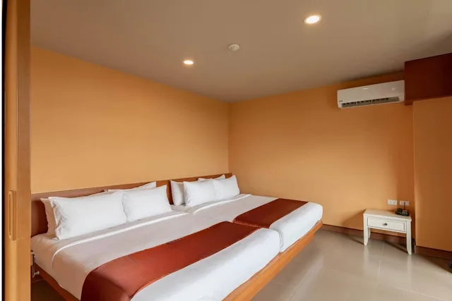 Family Suite, 2 Queen Beds, Town View، ROYAL PINEAPPLE HOTEL a welcome to wealth and good fortune 1/10