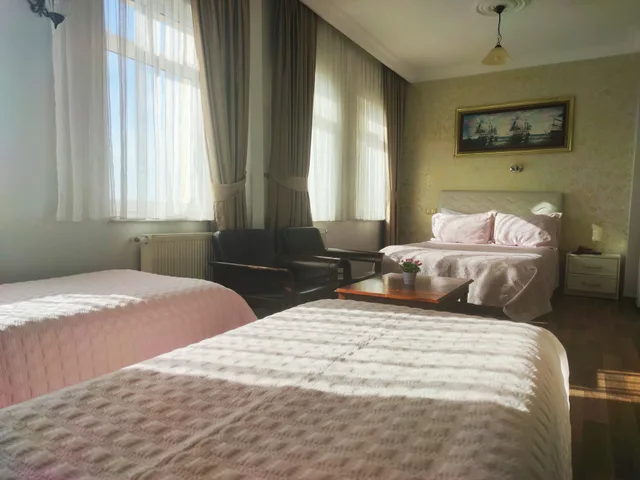 جناح عائلي بسرير كوين وسريرين منفصلين بإطلالة على البحر، Sur Hotel 6/10