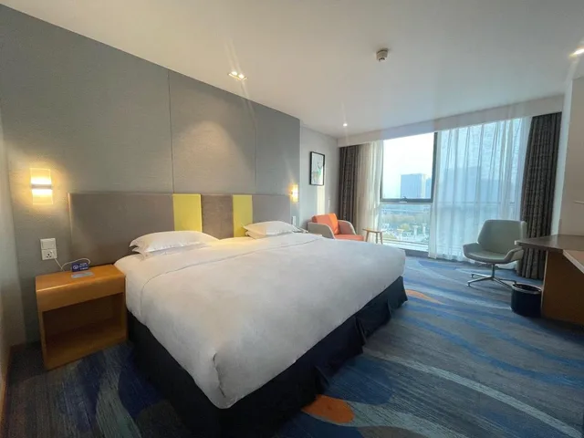 غرفة بسريرين منفصلين وسرير كينج، Holiday Inn Express Zhengzhou Zhengdong 5/6