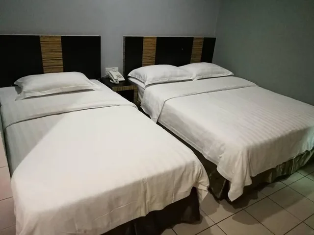 غرفة عائلية بسرير كوين وسرير فردي، Hotel Traveller 2/3