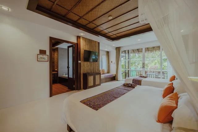 كوخ بريميير ثلاثي بسرير مزدوج وسرير فردي، Ban Sainai Resort - SHA Extra Plus 8/10