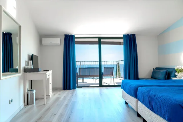غرفة ديلوكس بسرير مزدوج أو سريرين منفصلين بإطلالة على البحيرة، AHG Riva del Sole Wellness Hotel 3/10