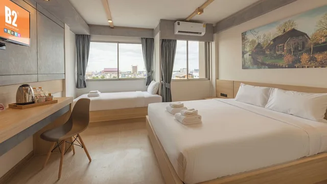 غرفة ديلوكس ثلاثية بسرير مزدوج وسرير فردي، B2 Surat Thani Boutique & Budget Hotel 1/4