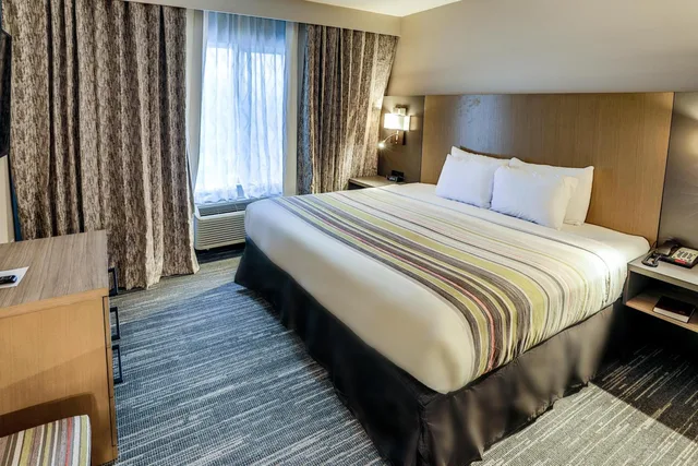 Suite, King Bed, Sofa, Country Inn & Suites By Radisson Nashville Airport TN 1/9